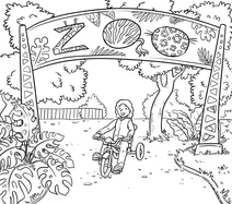 Child riding a tricycle at the zoo entrance